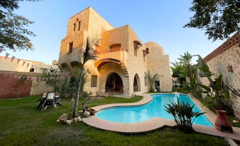 This Cairo Villa Has a Hassan Fathi Dome & a Dog Who Silently Judges