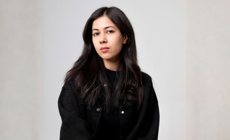 This Dubai-Based Artist Is Painting Landscapes On Sneakers 