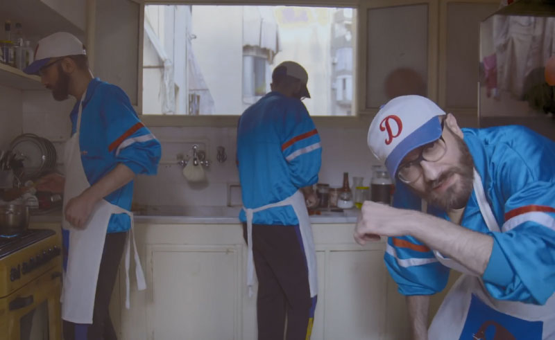 A Laid-Back El Rass Butchers Heads with a Smile in ‘Vodka W Cerelac’