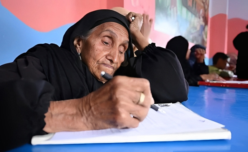 Actress Angelina Jolie Spotlights Egyptian Woman Taking Literacy Test